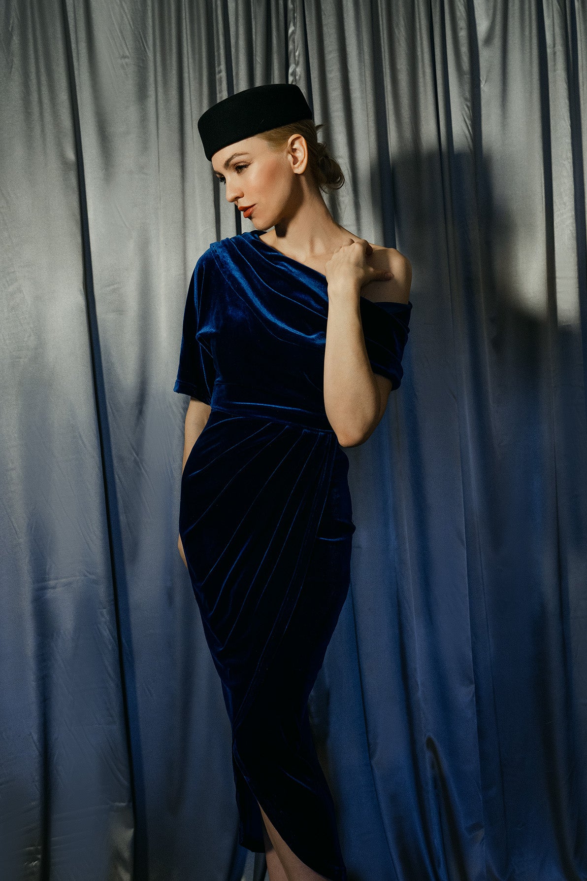 modern pillbox hat paired with velvet dress